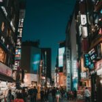 Colorful Korean street signs and hangul writing in a busy Seoul city neighborhood